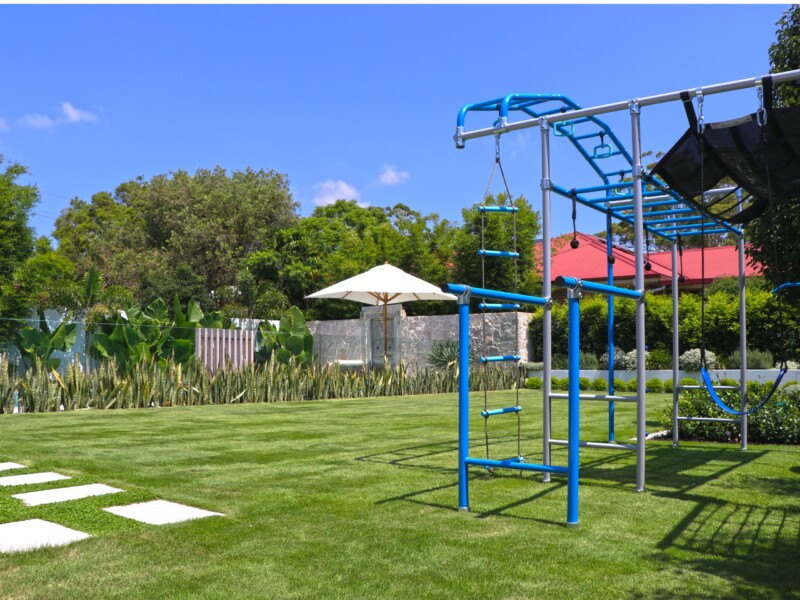 Big backyard with kid's play gym and lots of space for pets