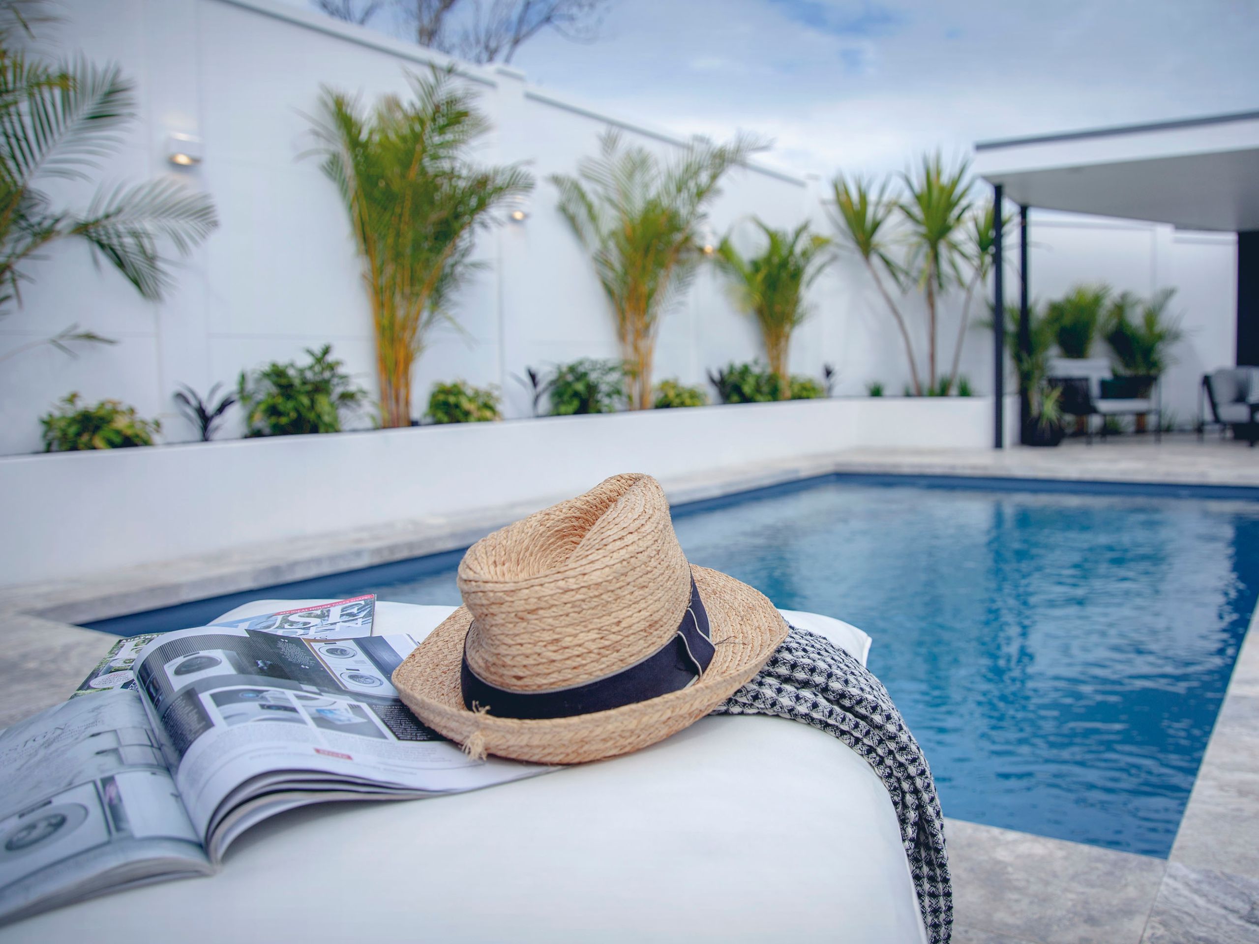 Poolside retaining walls are a great way to incorporate more landscaping