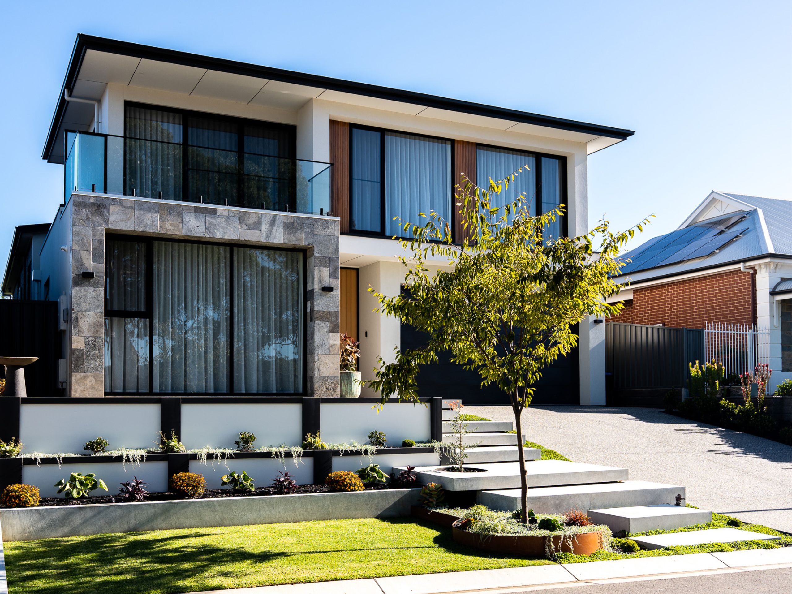 A monochrome retaining wall is a creative retaining wall idea