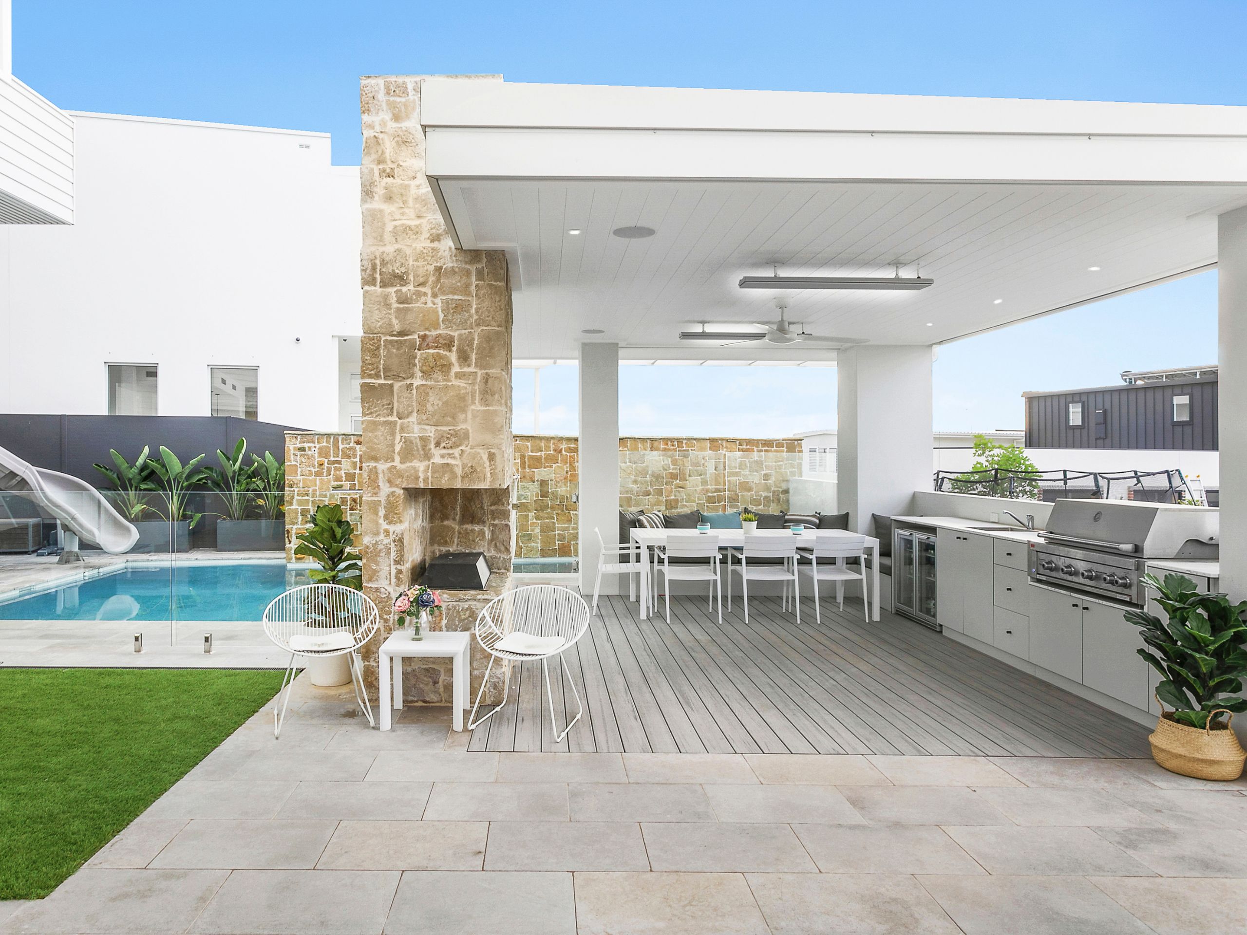 Consider proximity and layout when designing your outdoor kitchen