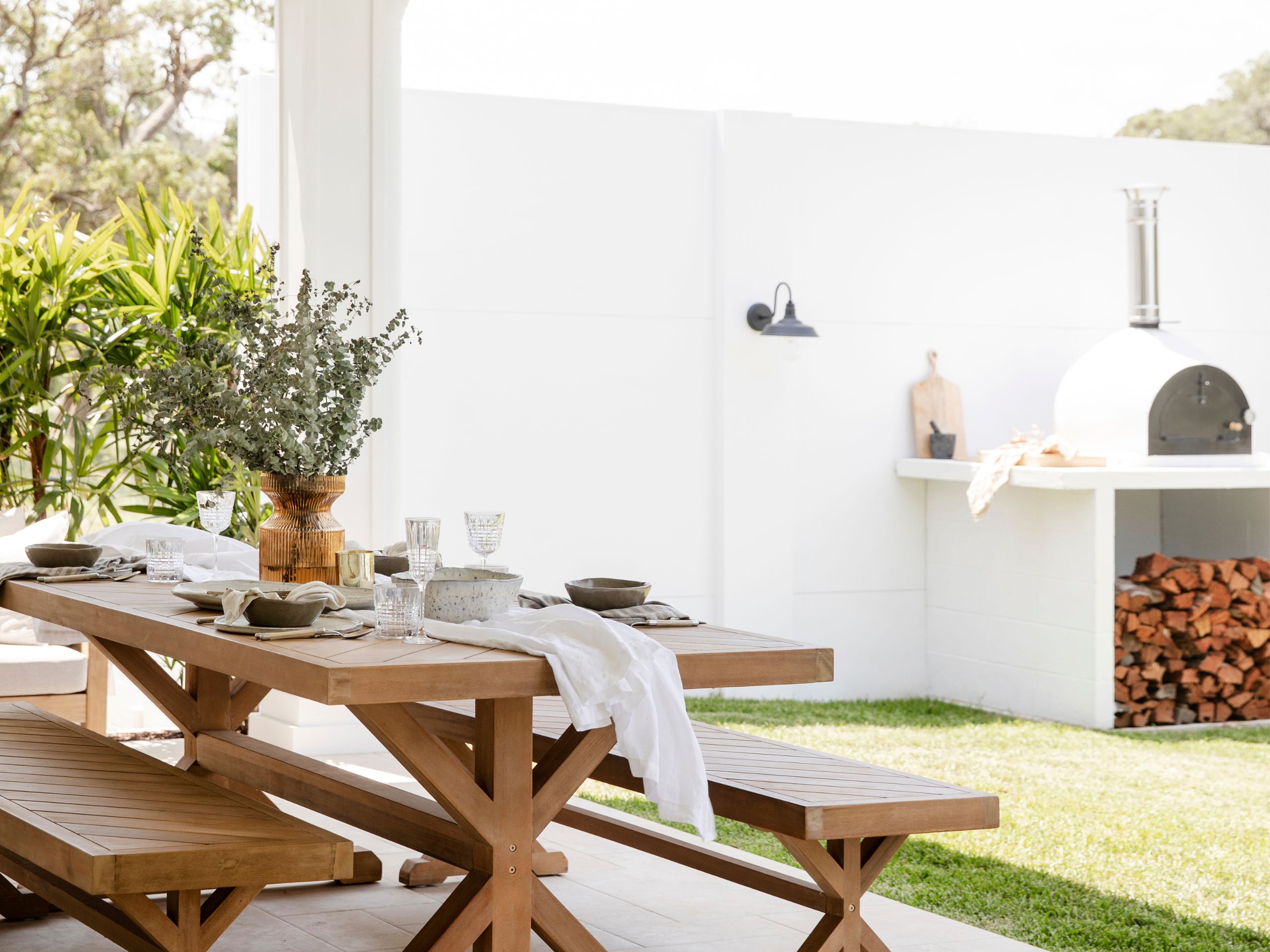 Keep seating and cushions handy for a comfortable alfresco entertaining space