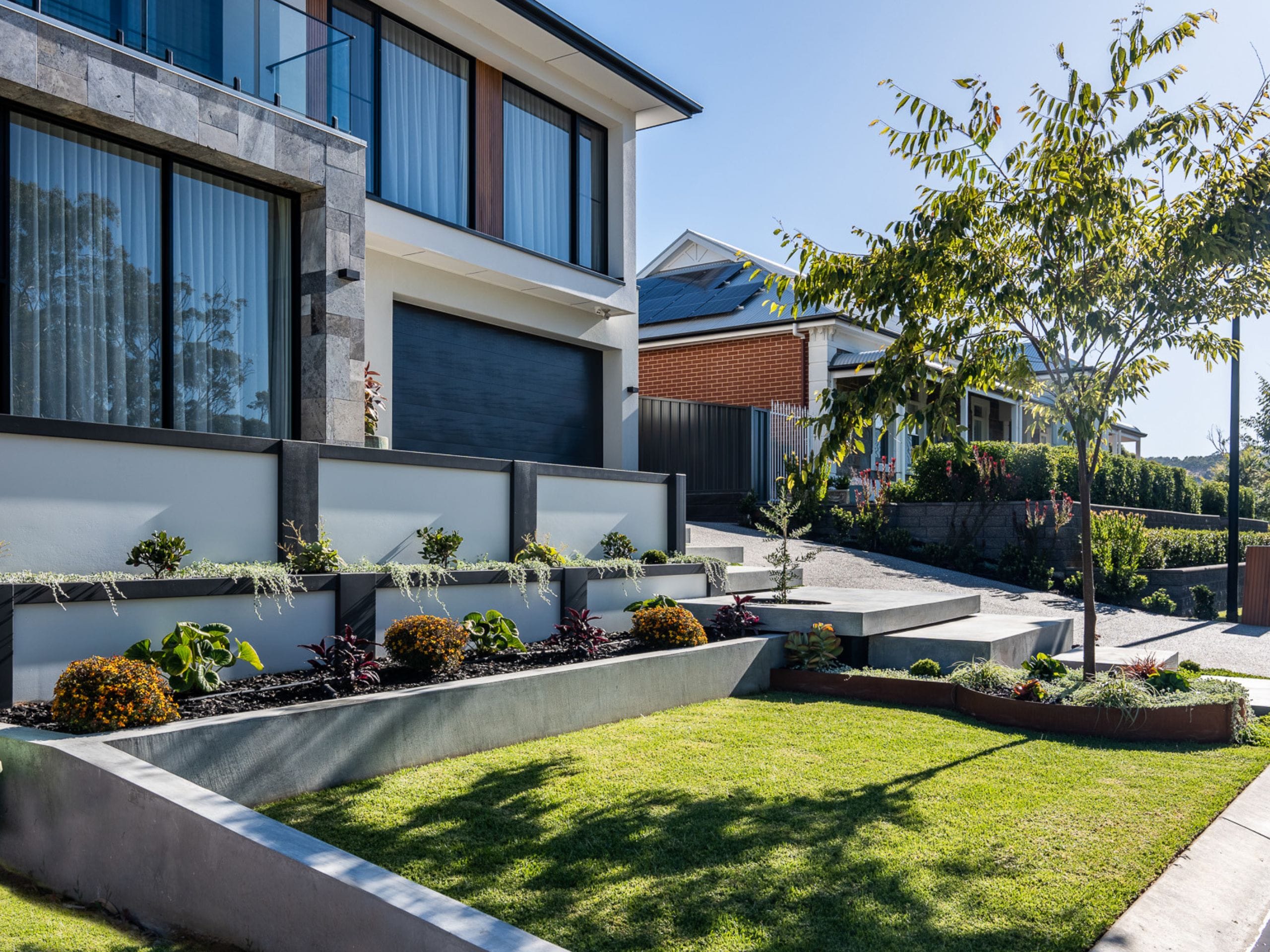 An integrated retaining wall solution is ideal for a sloping block