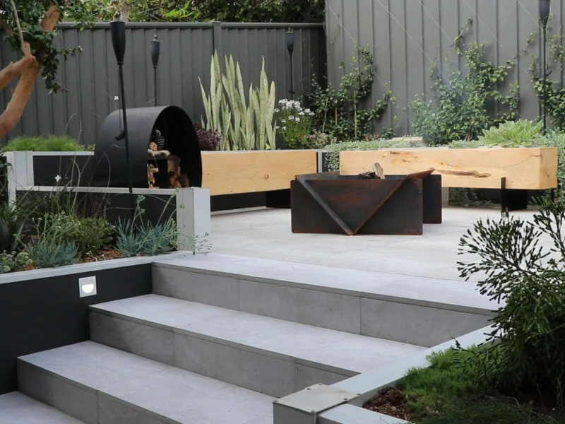 Katesparks DIY projects outdoor courtyard with bench seats and fire pit