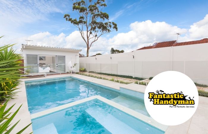 Expert Advice from Fantastic Handyman - SlimWall Boundary wall featuring a Pool