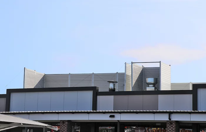 AcoustiSorb Acoustic Enclosure for Woolworths Rooftops | ModularWalls
