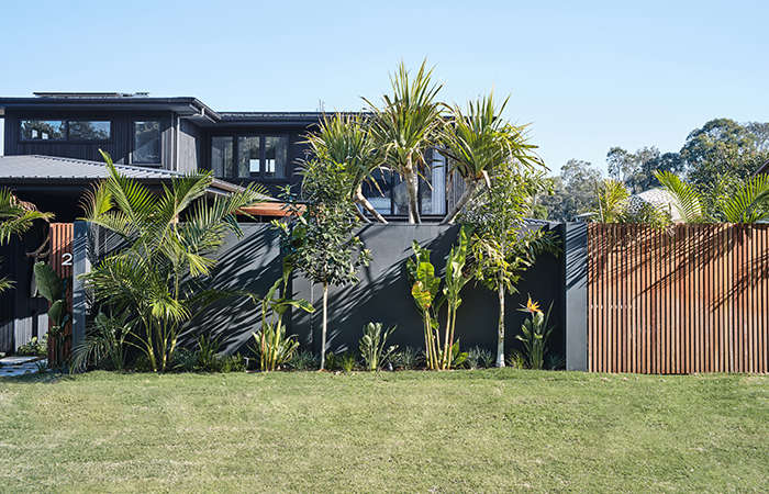 The Designory Byron Bay Villa chooses a dark paint colour for their ModularWalls VogueWall 
