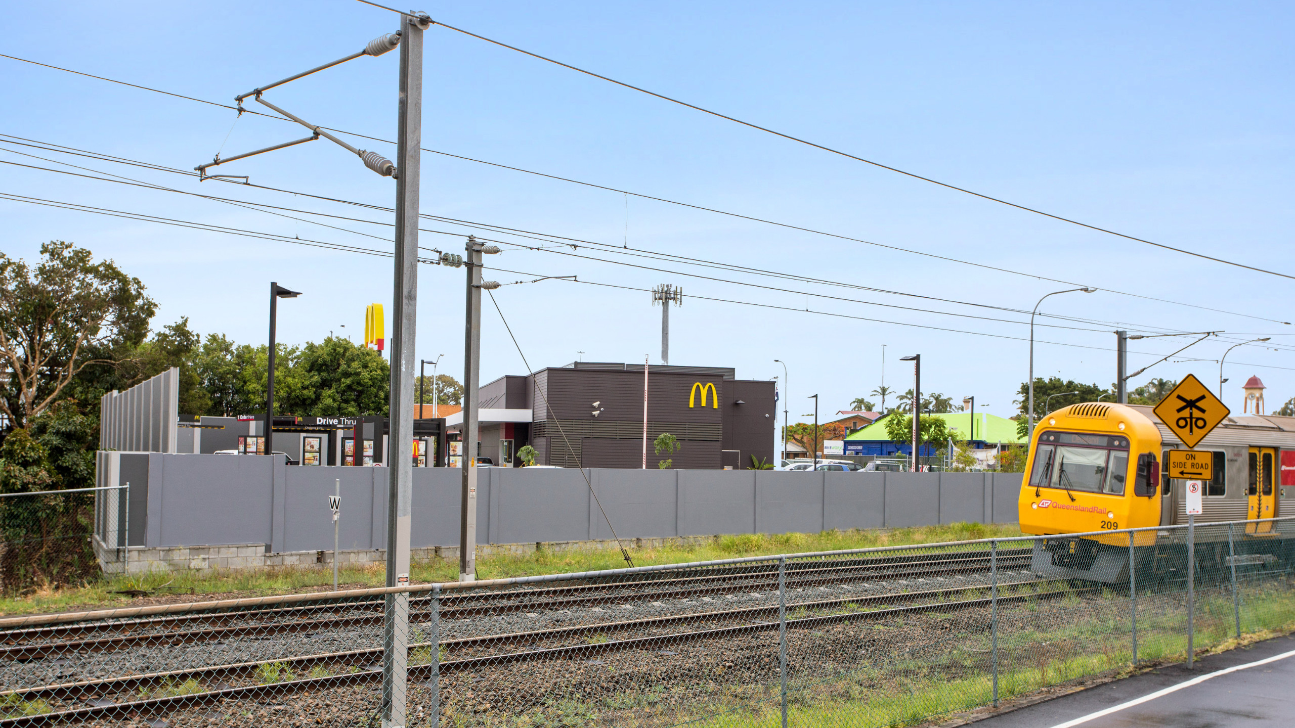 Visuals meet acoustics to protect McDonald's restaurant from railway