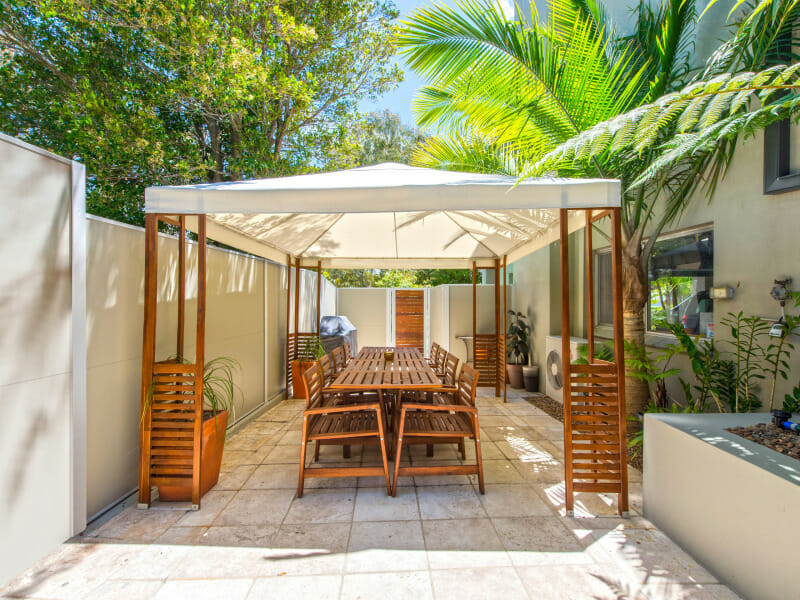 Outdoor living space with sun shade 