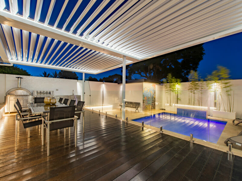 Outdoor Living Zones - Kitchen with SlimWall Pool and Boundary fence