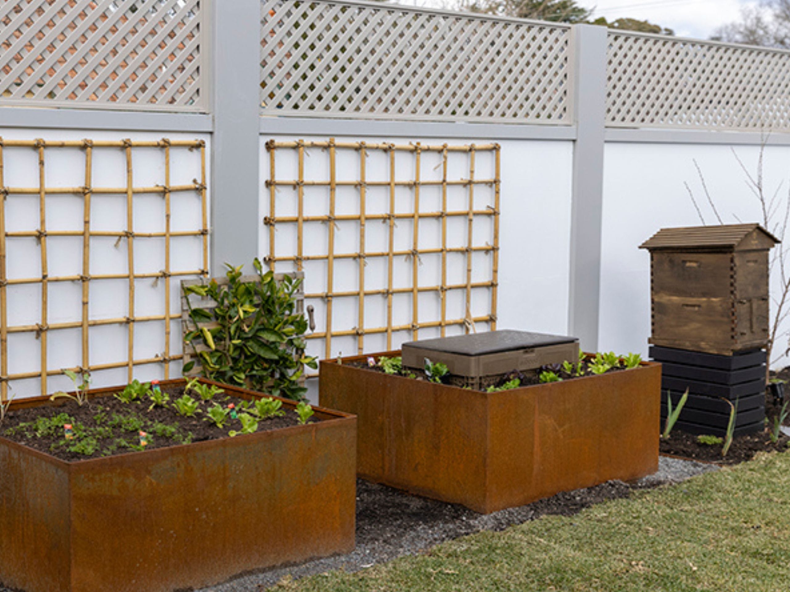 Adding trellis panels or decorative metal elements can introduce both texture and functionality.