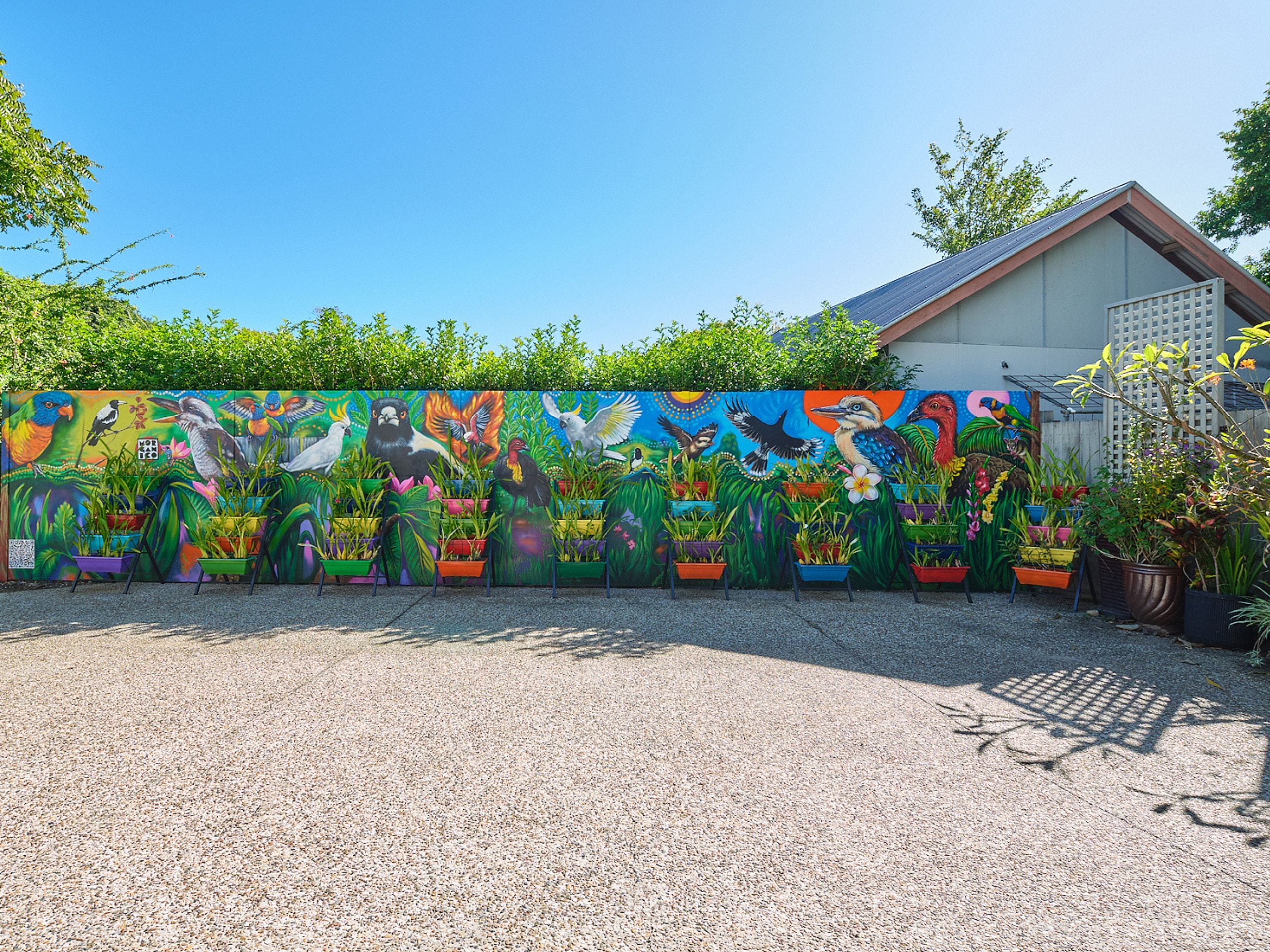 For homeowners who love greenery, living walls continue to be one of the most sought-after outdoor feature wall ideas.
