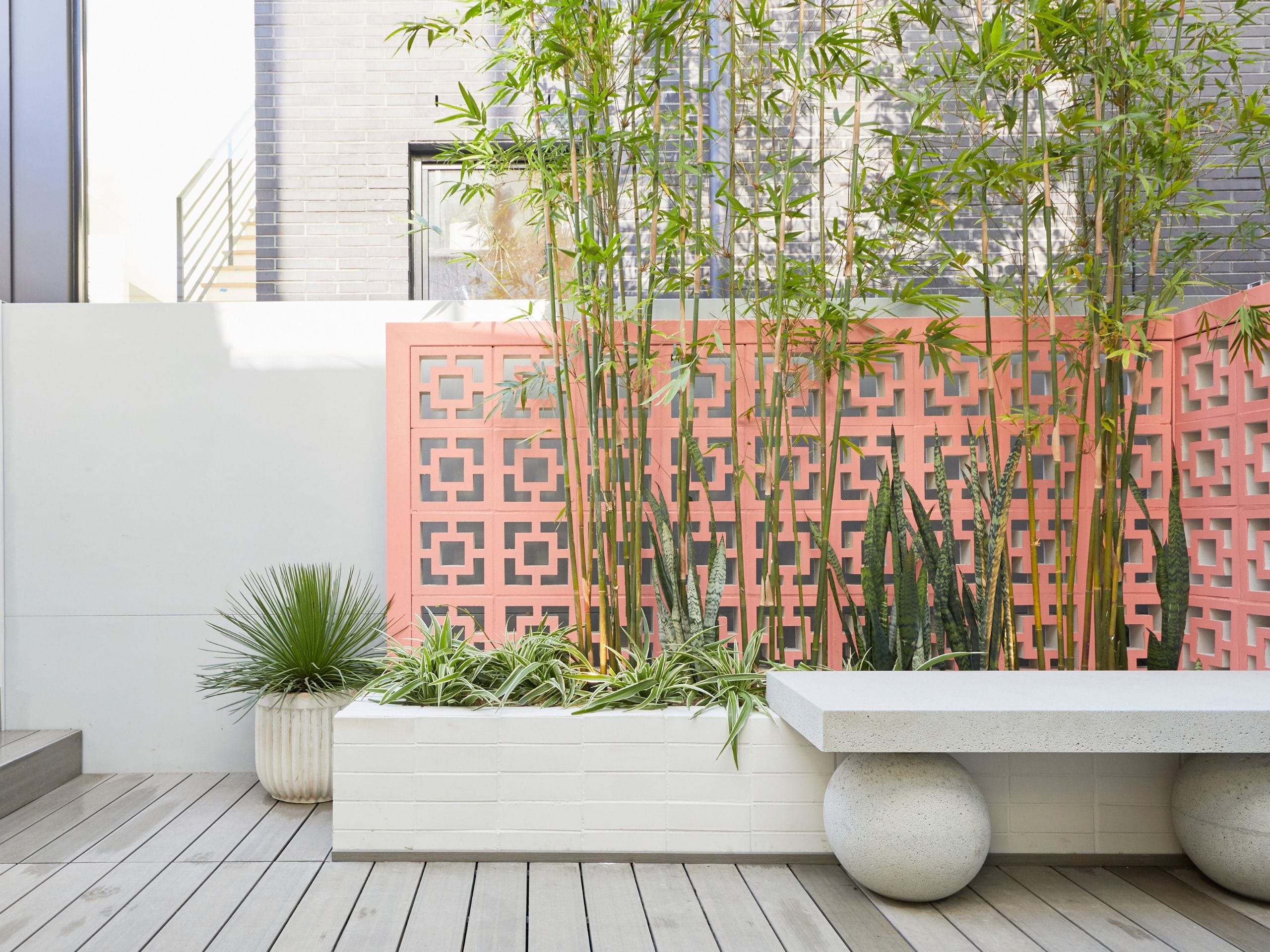 Bamboo continues to be a popular material for tropical and resort-inspired outdoor spaces.