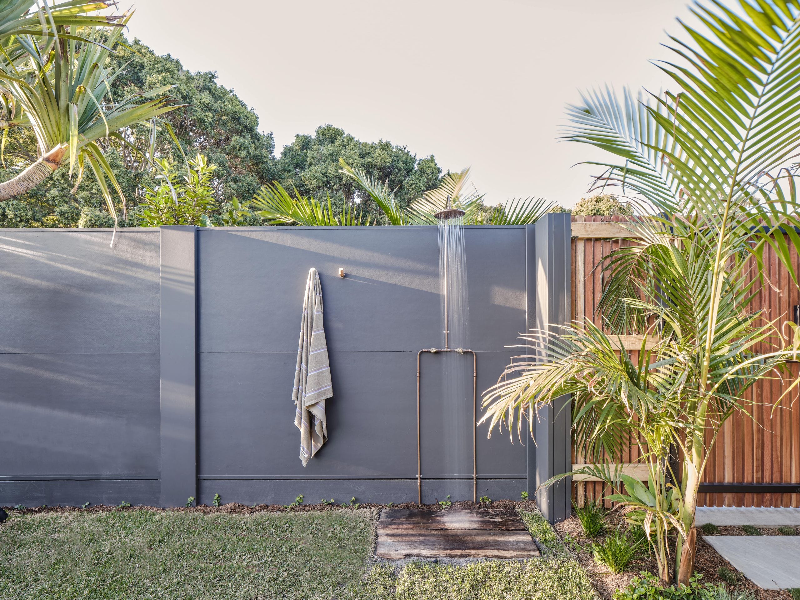 An outdoor shower provides functional style