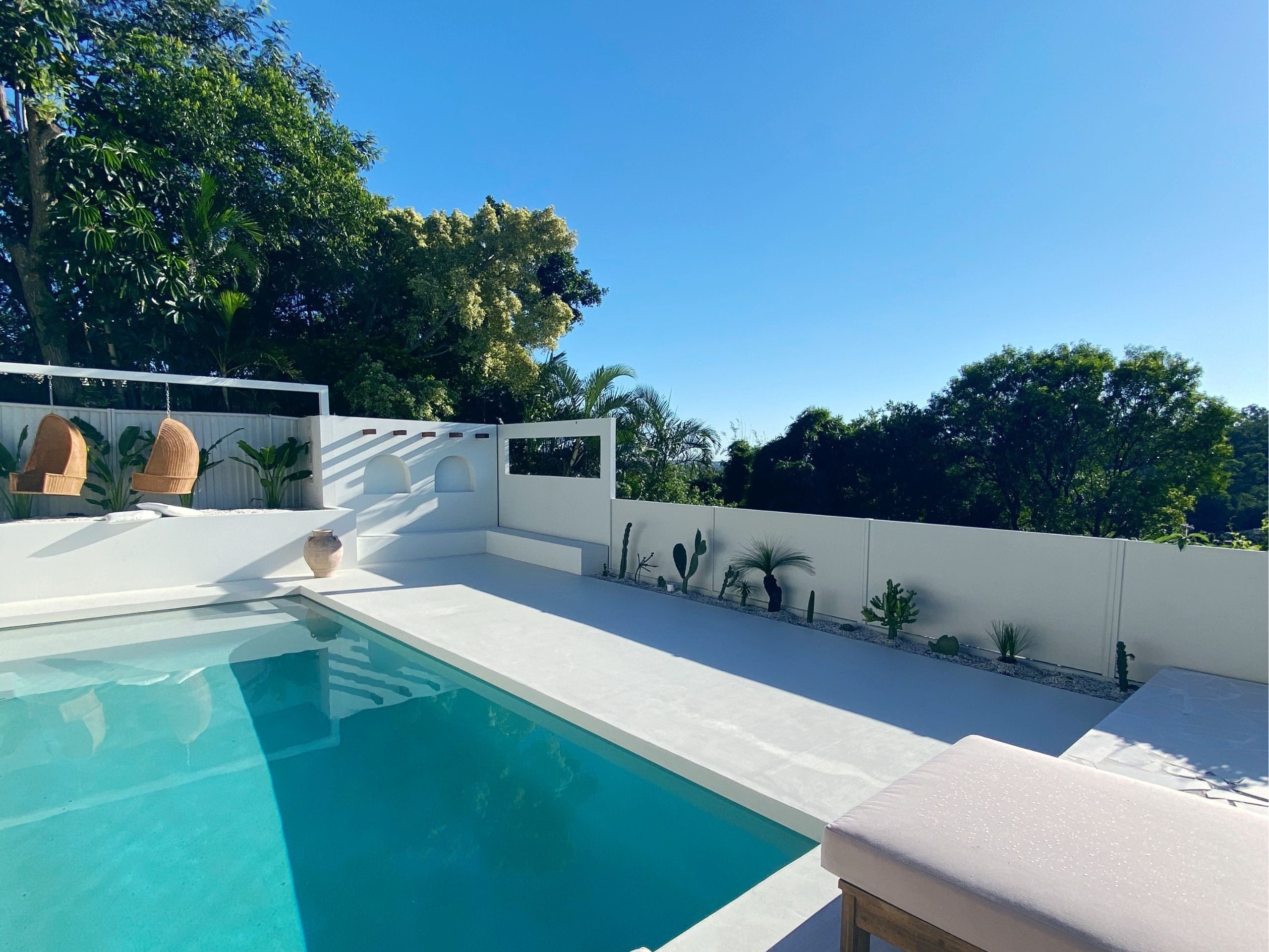 A modern Mediterranean pool area is timeless