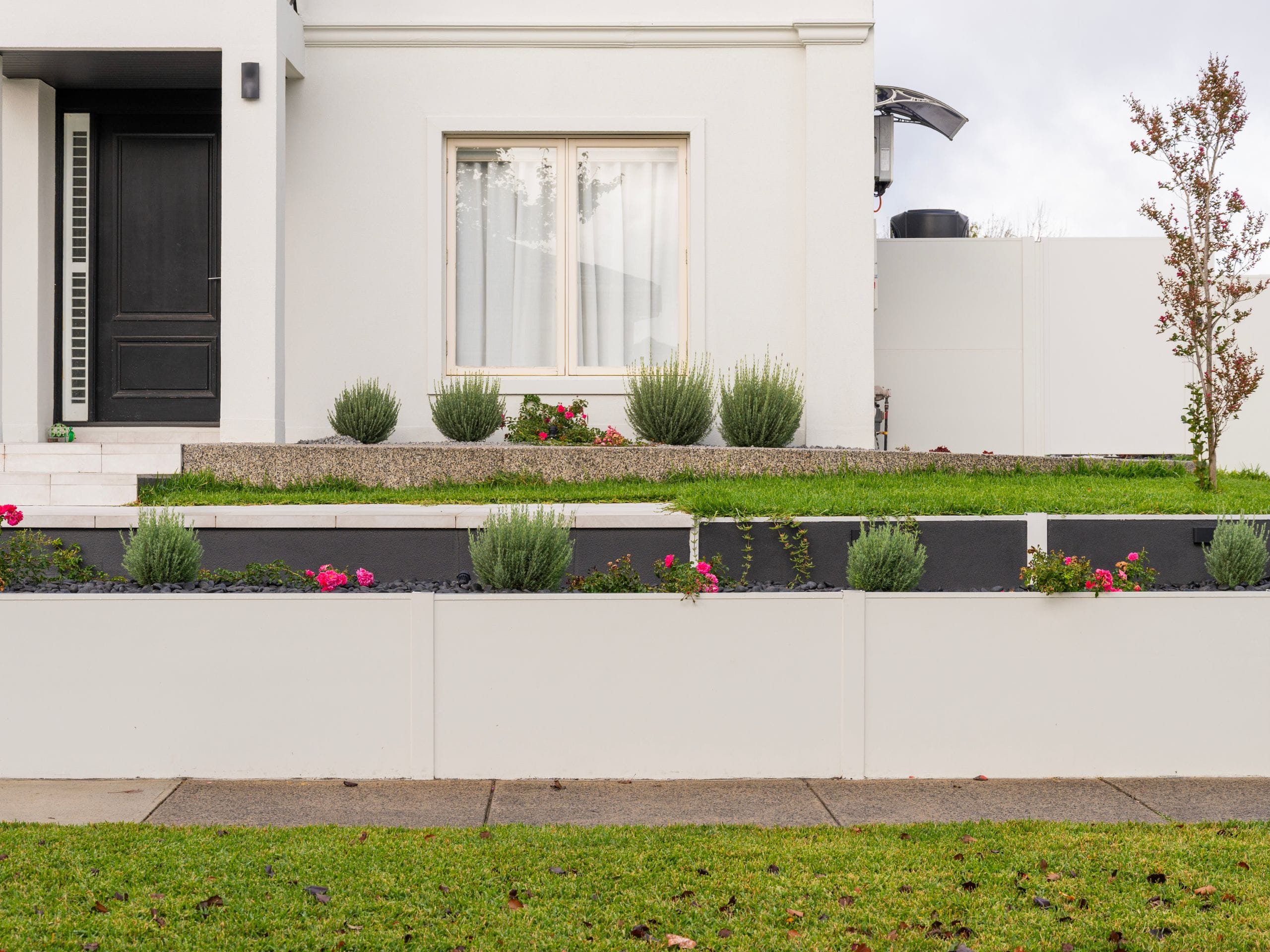 Retaining walls assist with uneven ground