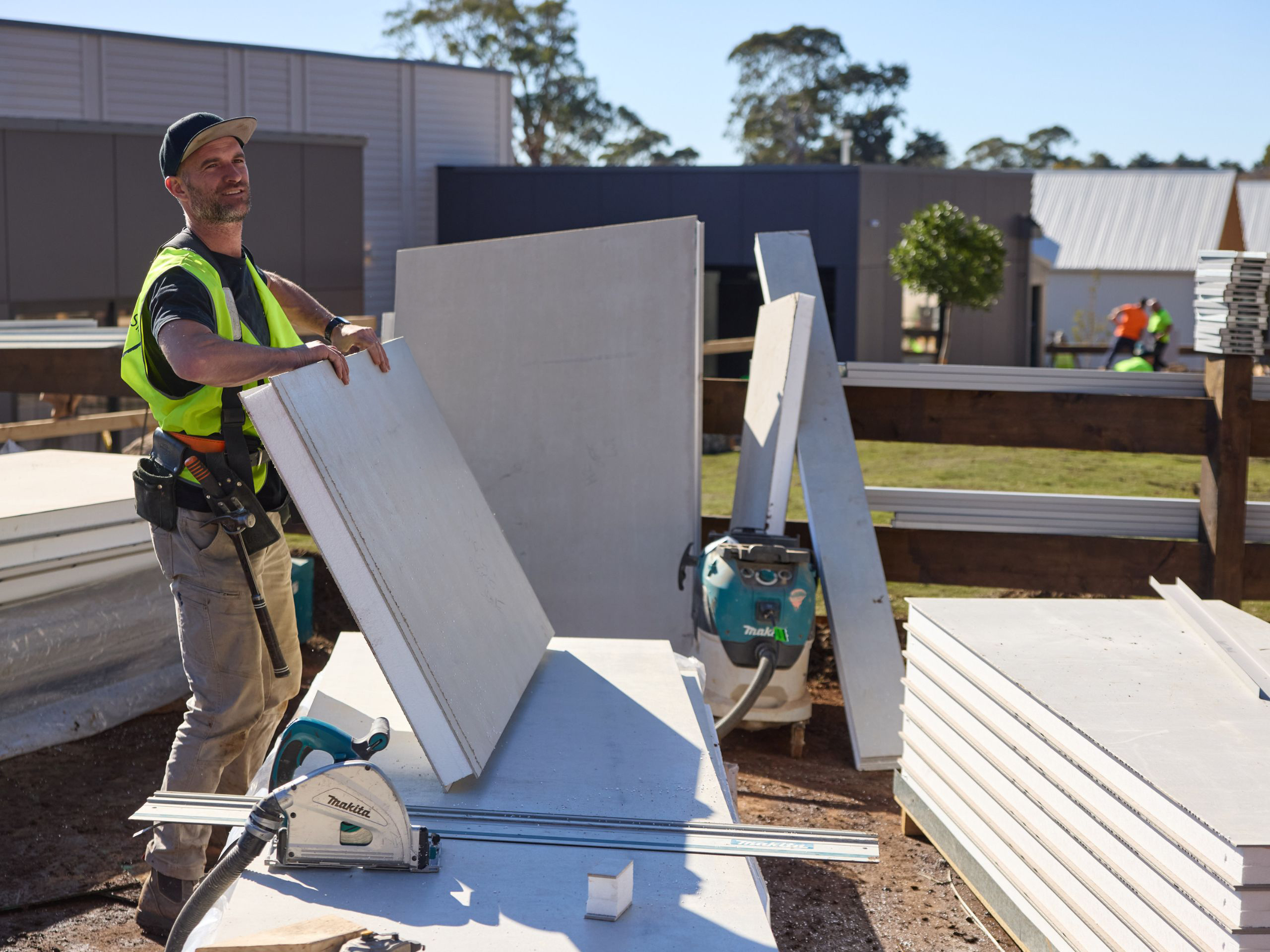 Block Staff Carrying A ModularWalls Panel