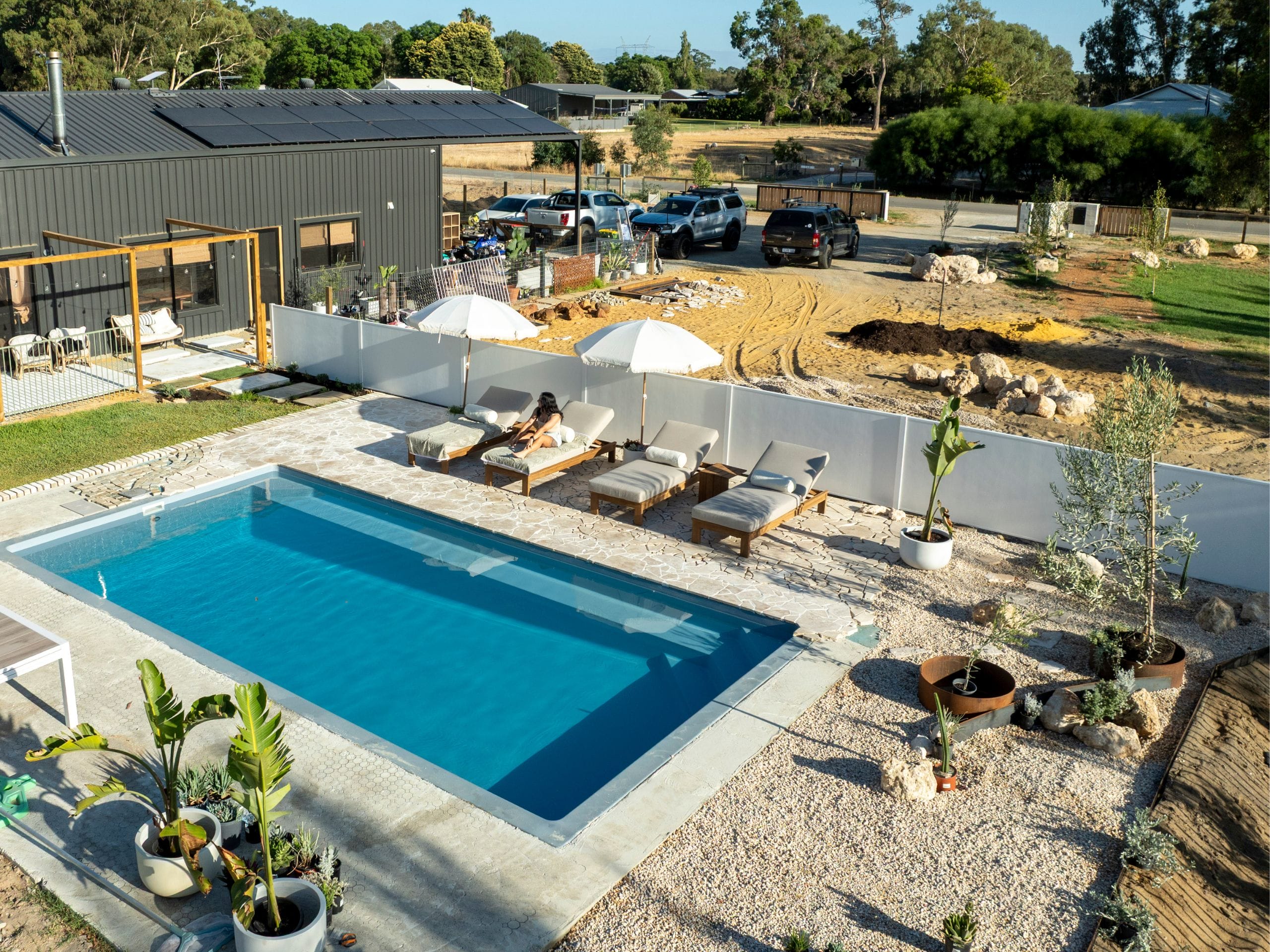 A DIY pool fence transforms this rural oasis