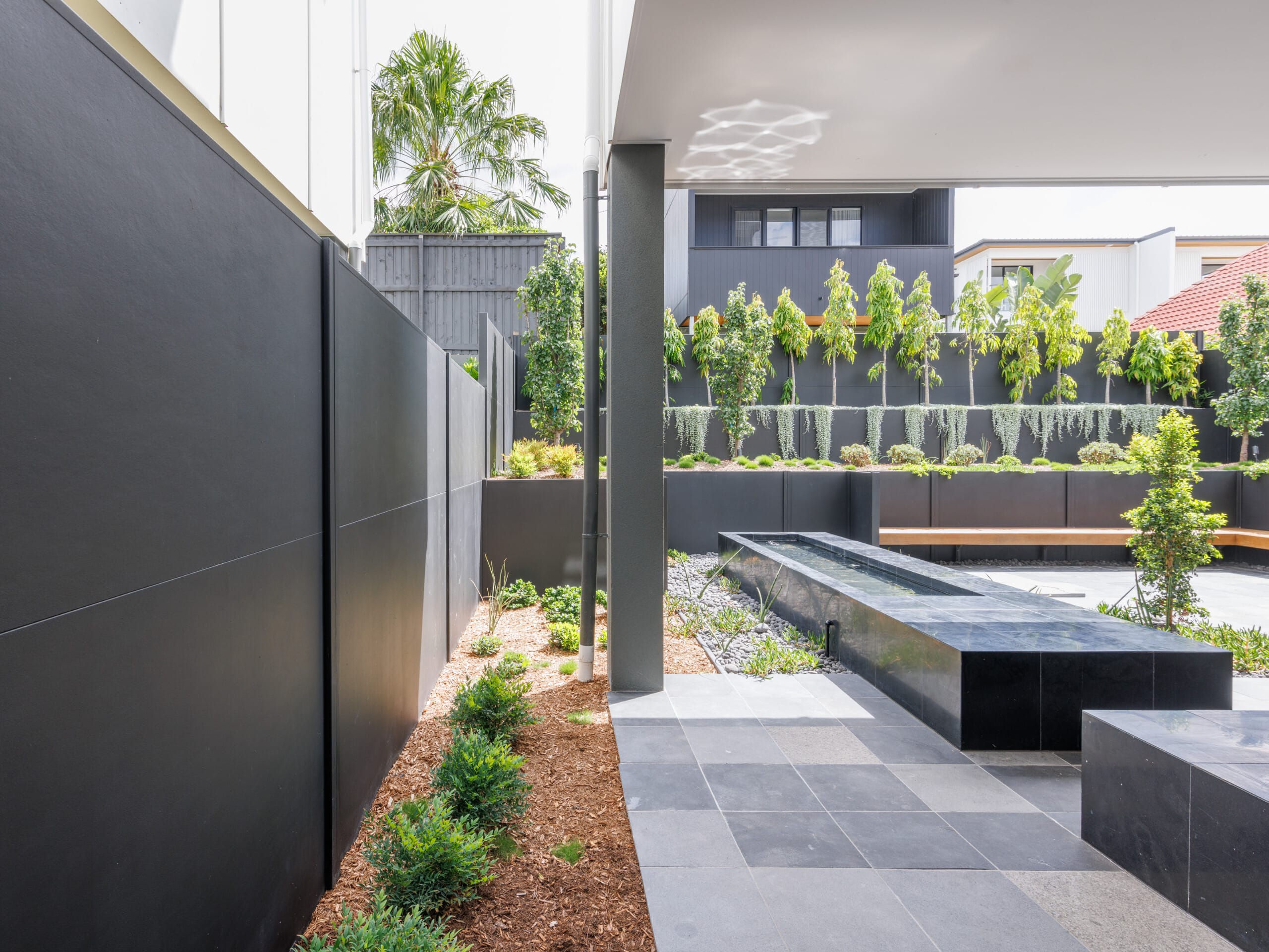 Create a stylish outdoor space with a composite retaining walll