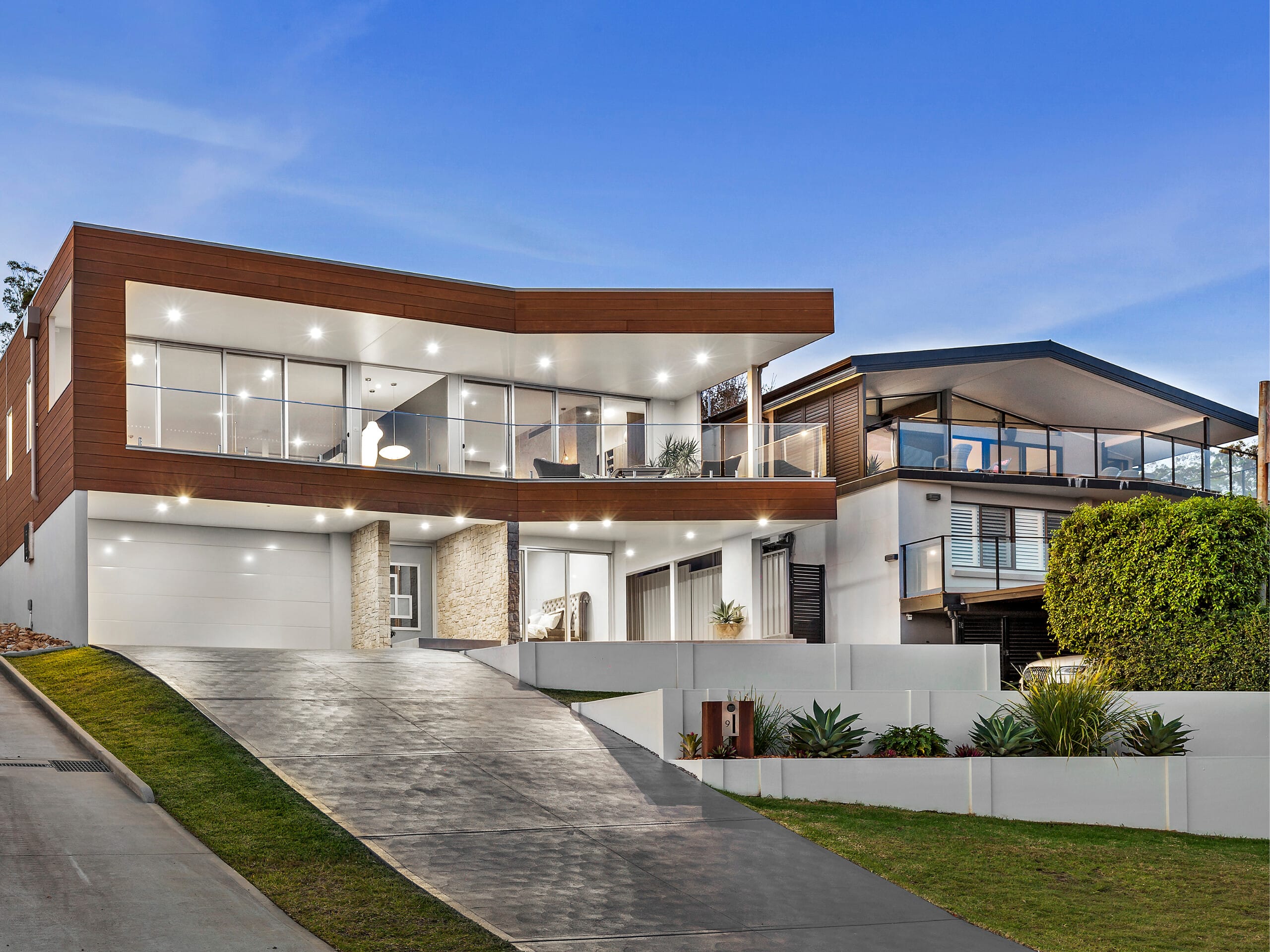 A retaining wall provides an interesting design feature