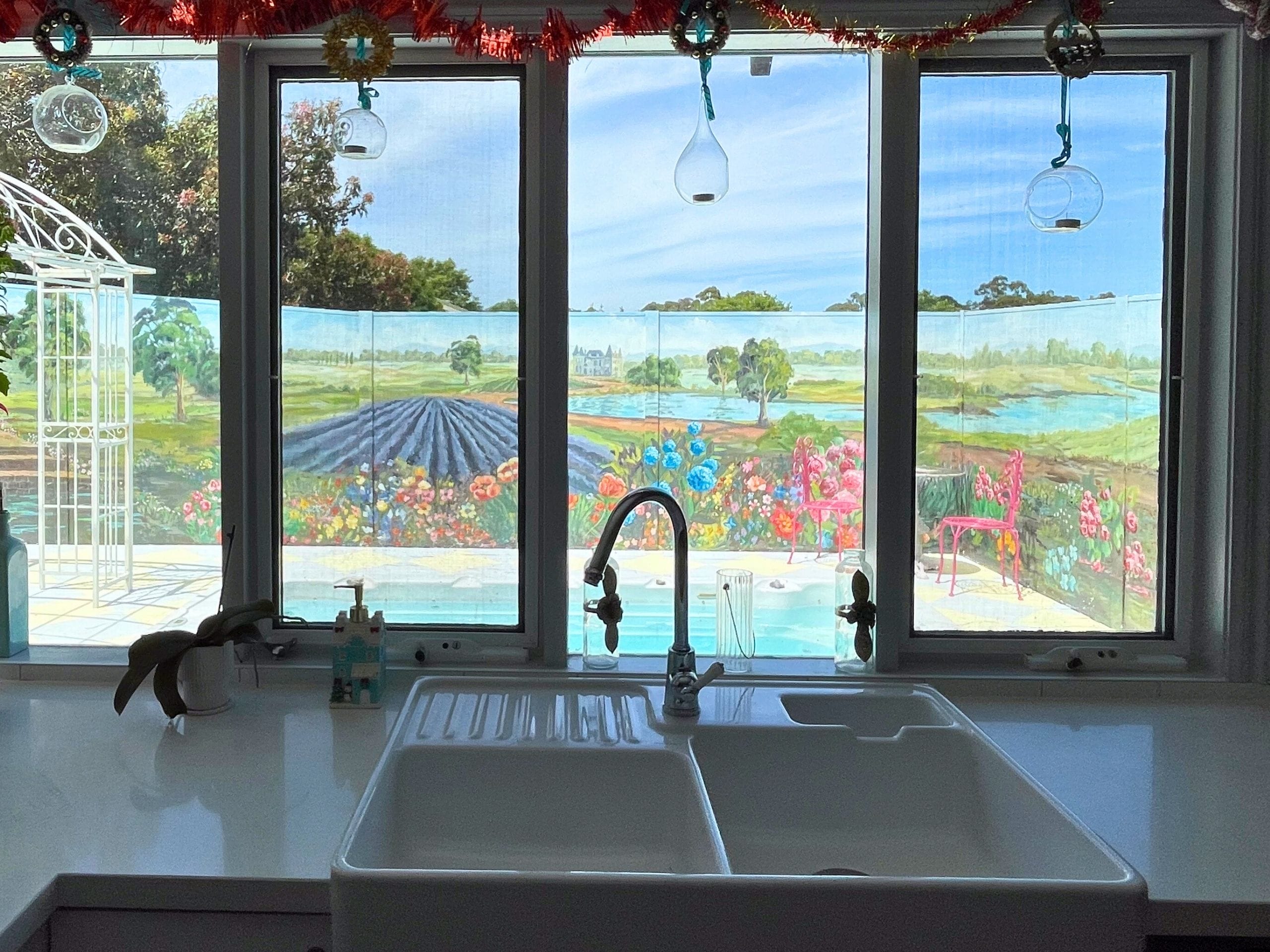  The expansive surface of the ModularWalls enabled her to unleash her imagination and create a stunning array of painted flowers for her fence artwork