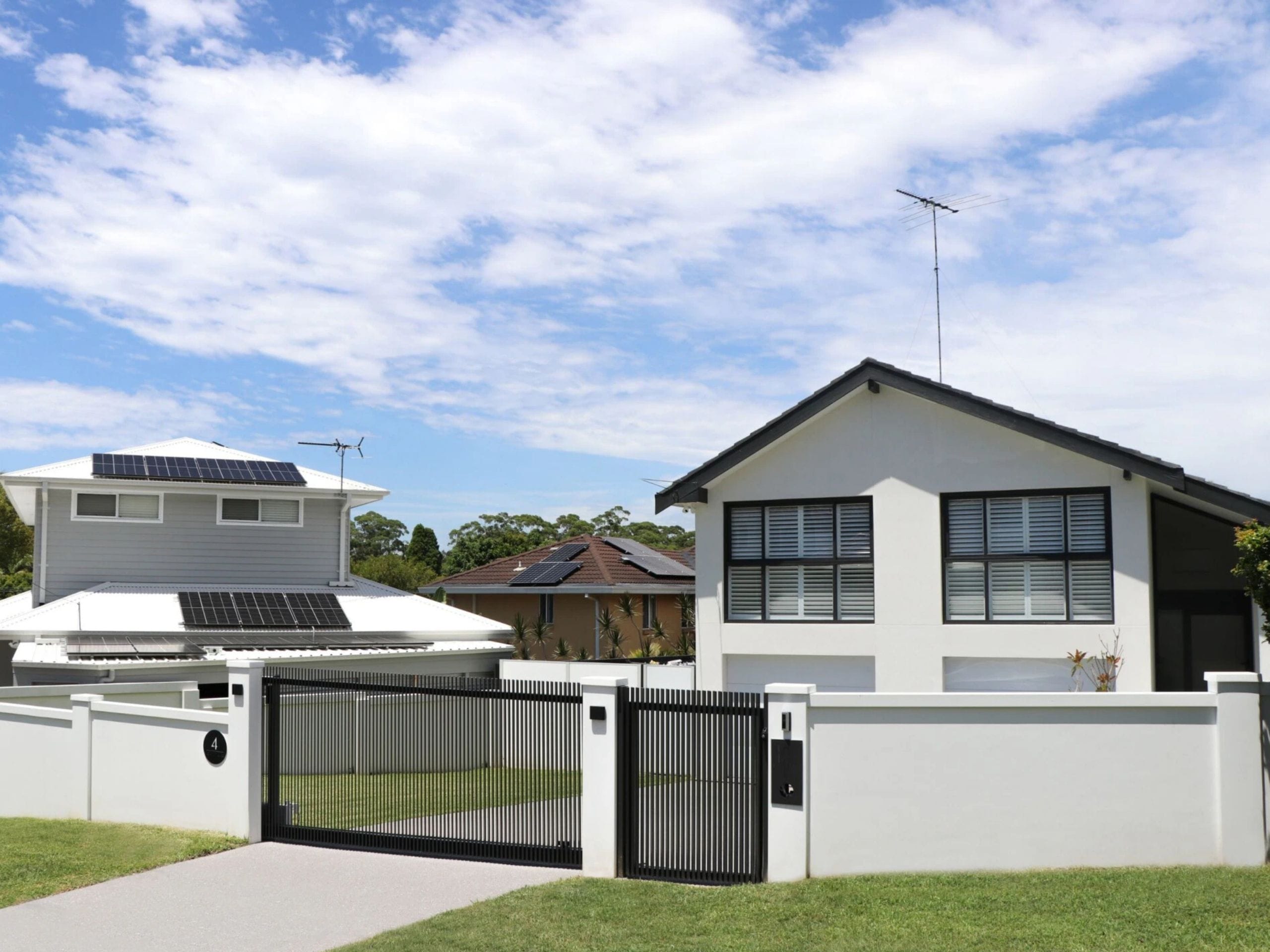 Front yard fence ideas: automated driveway gate