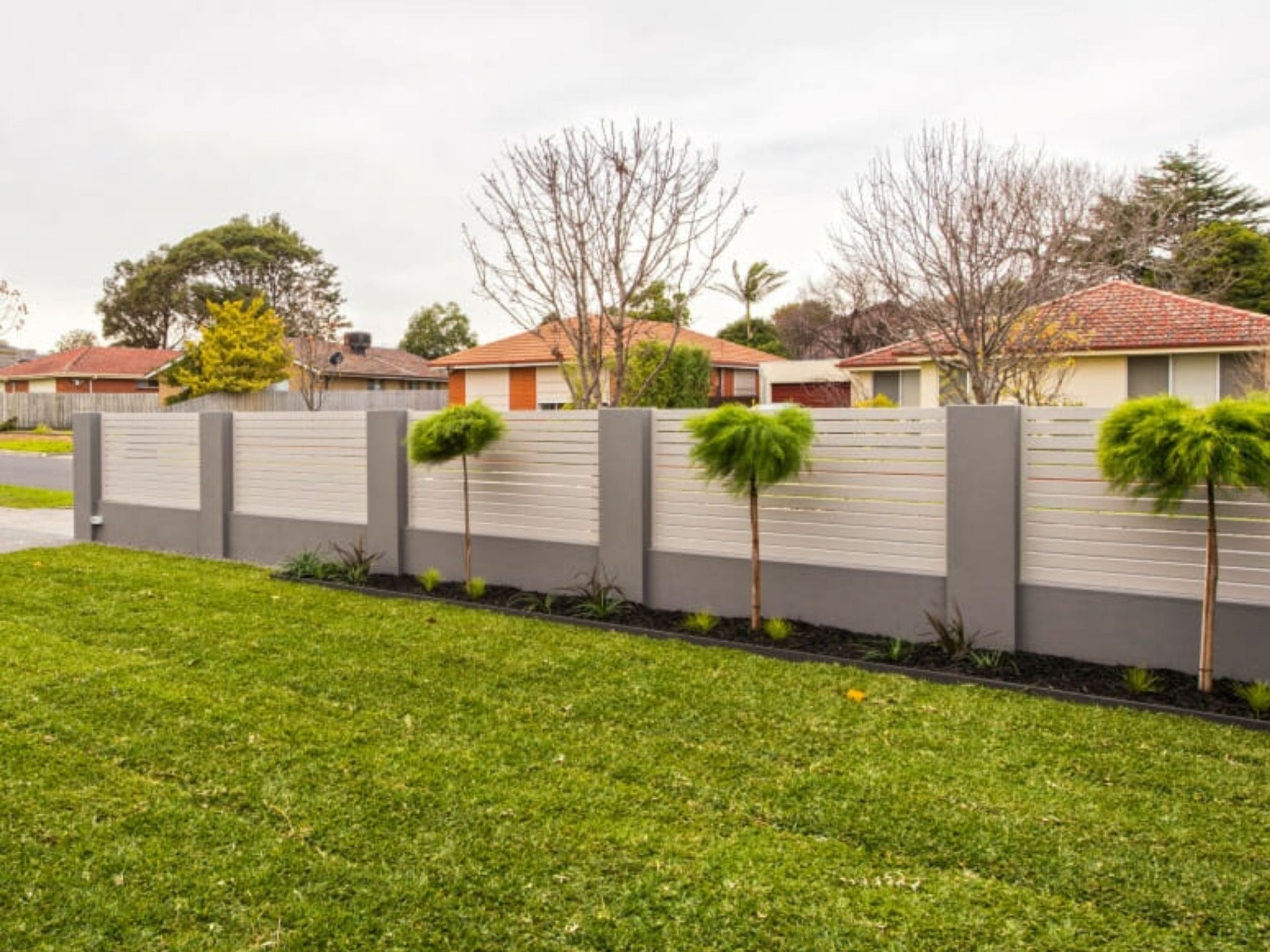 Aluminium slats are a durable, low-maintenance option that introduces horizontal lines and measured transparency