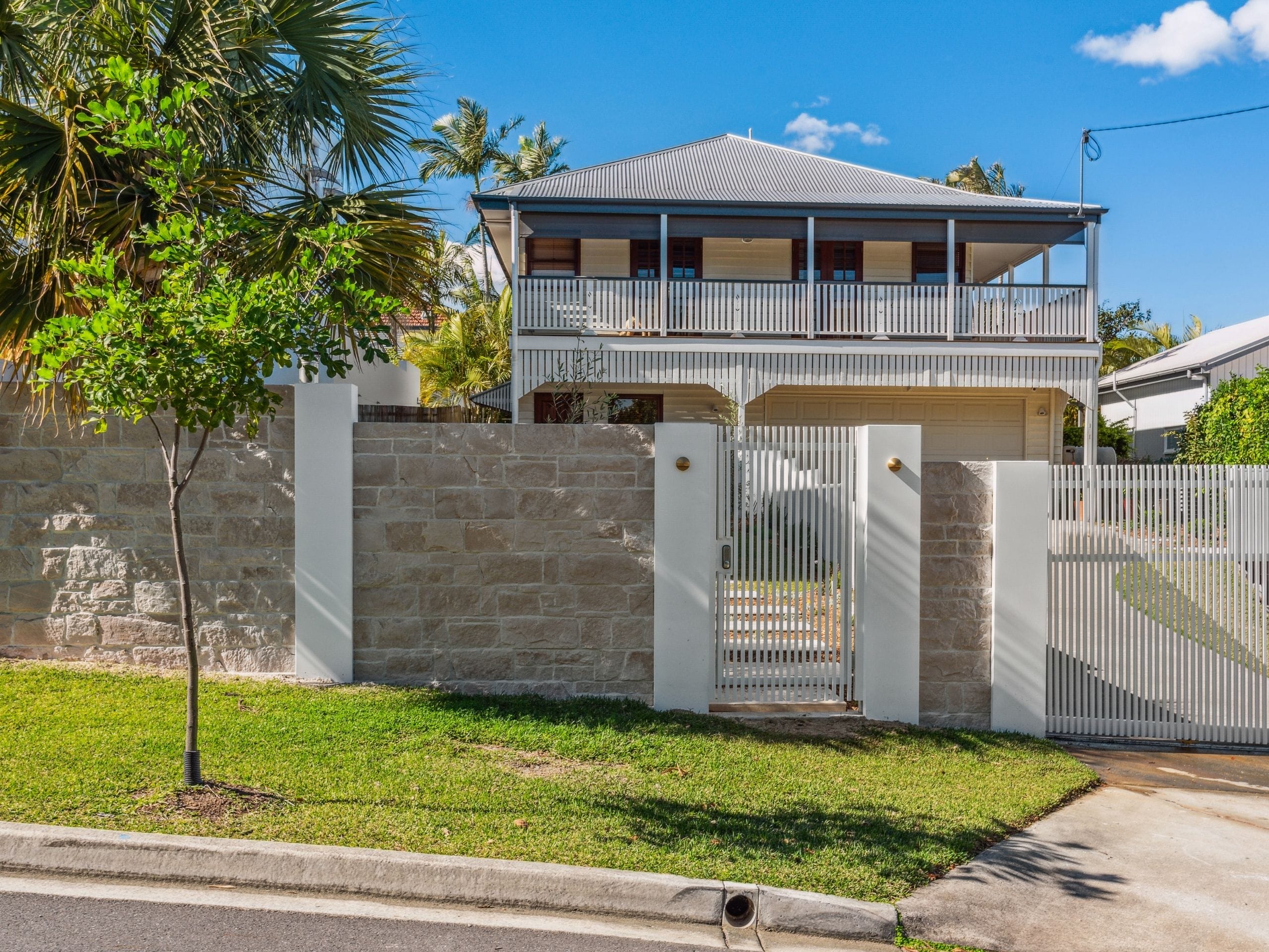 Transform a plain fence into an eye-catching feature with stone cladding.