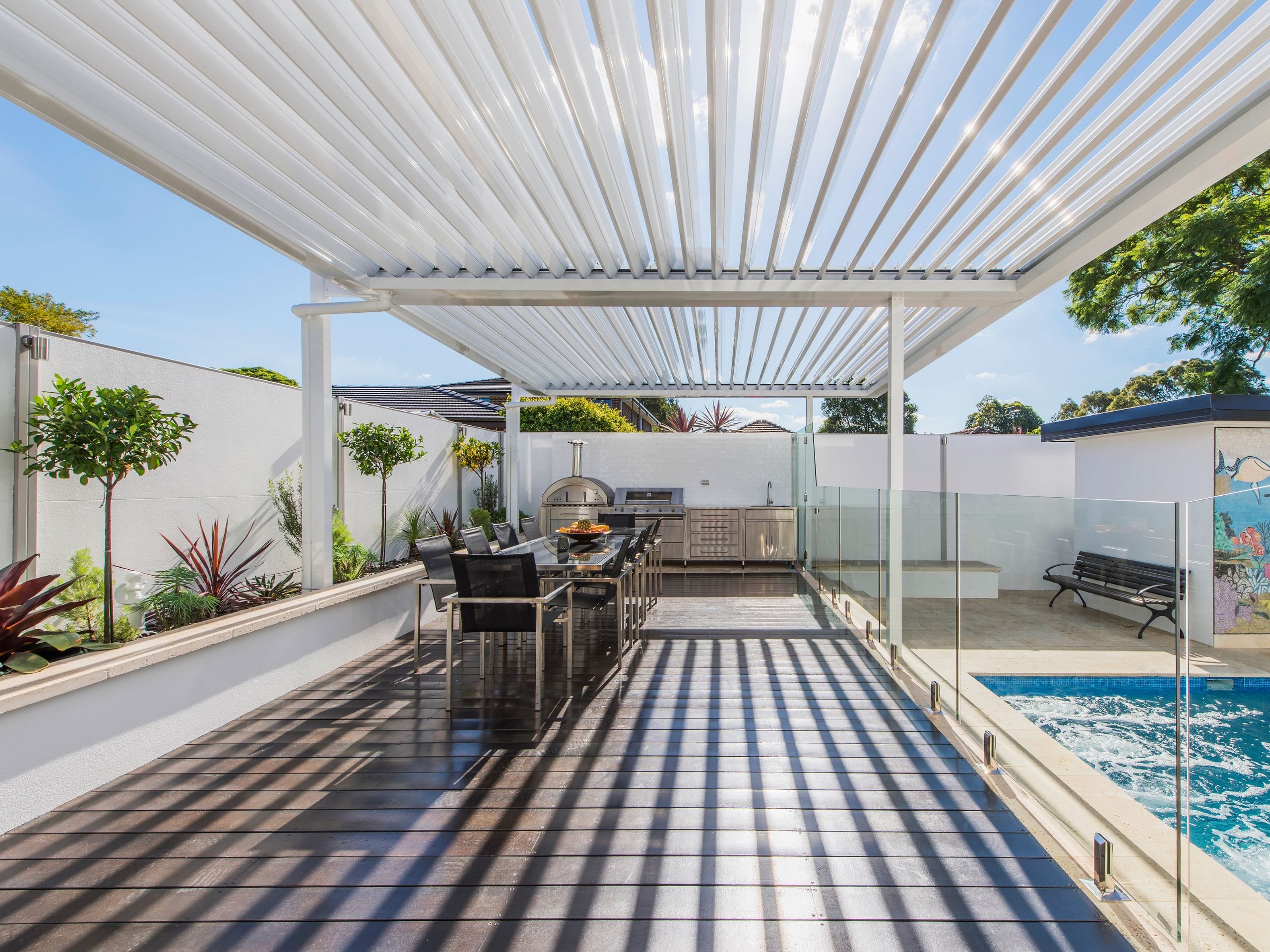 Create a resort feel with a pergola for yard privacy ideas
