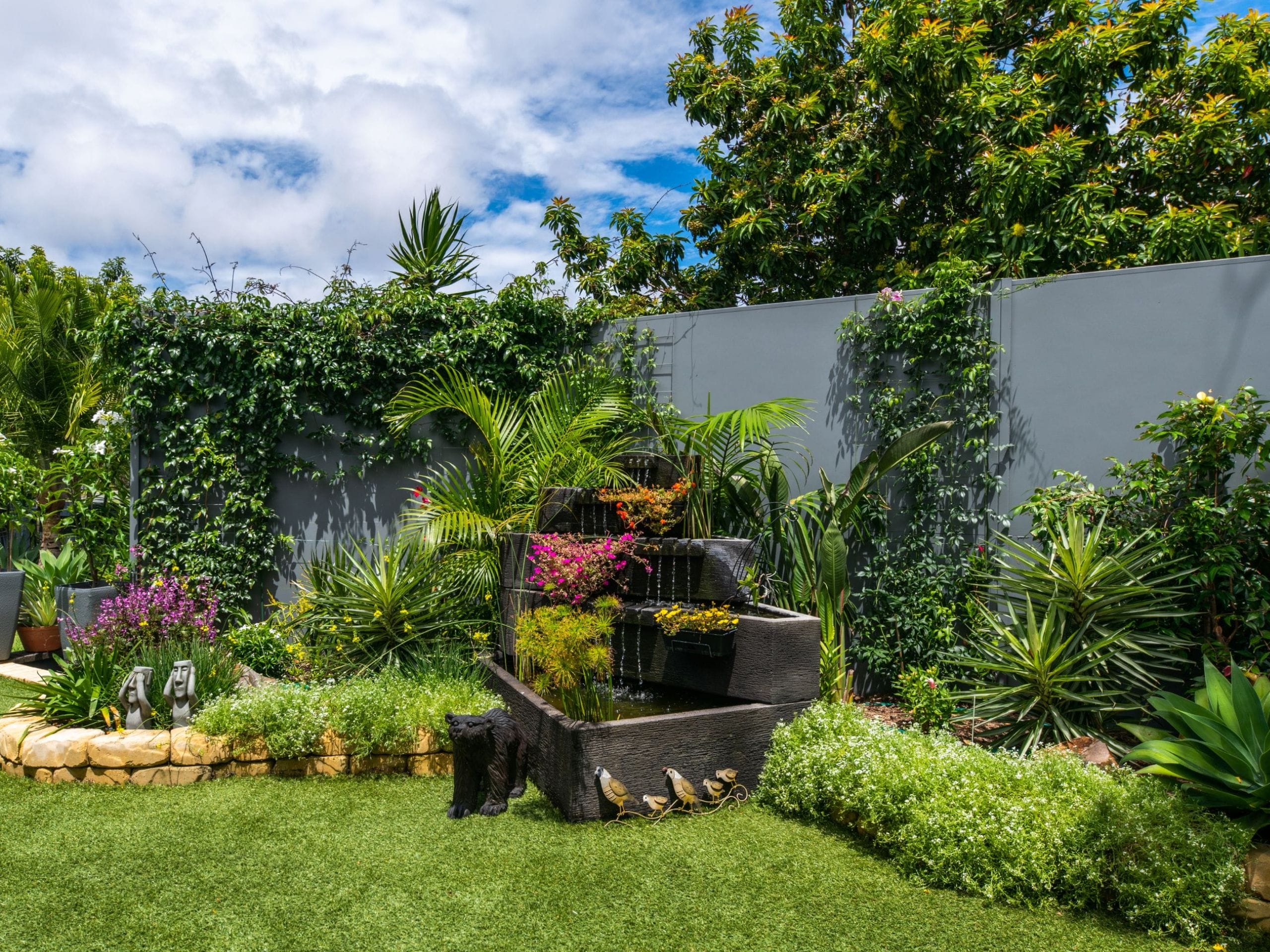 Use climbing plants or a green wall for yard privacy