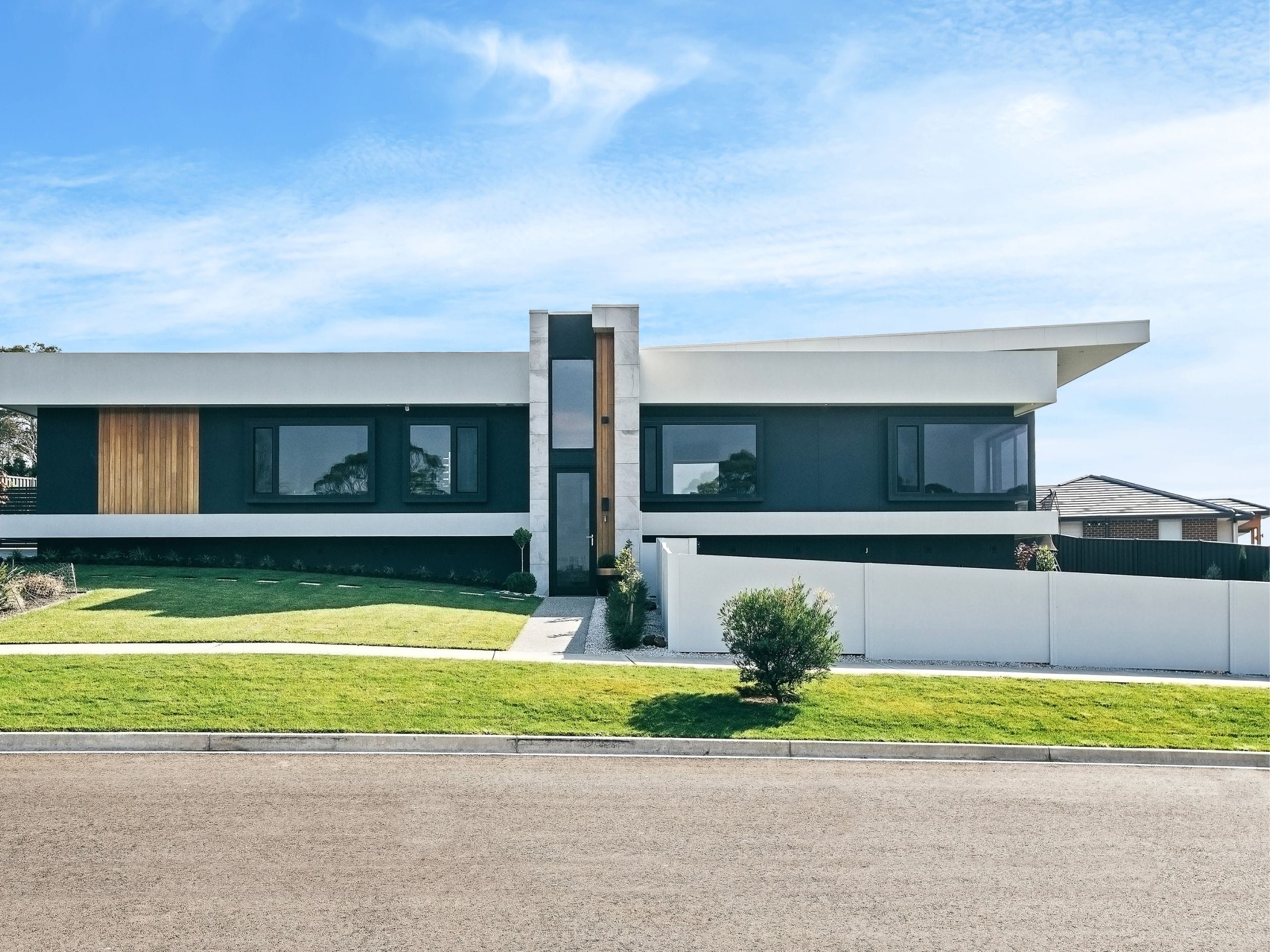 For contemporary homes, keeping your fence design simple allows your home's architecture to remain the focal point while creating a cohesive overall look. 