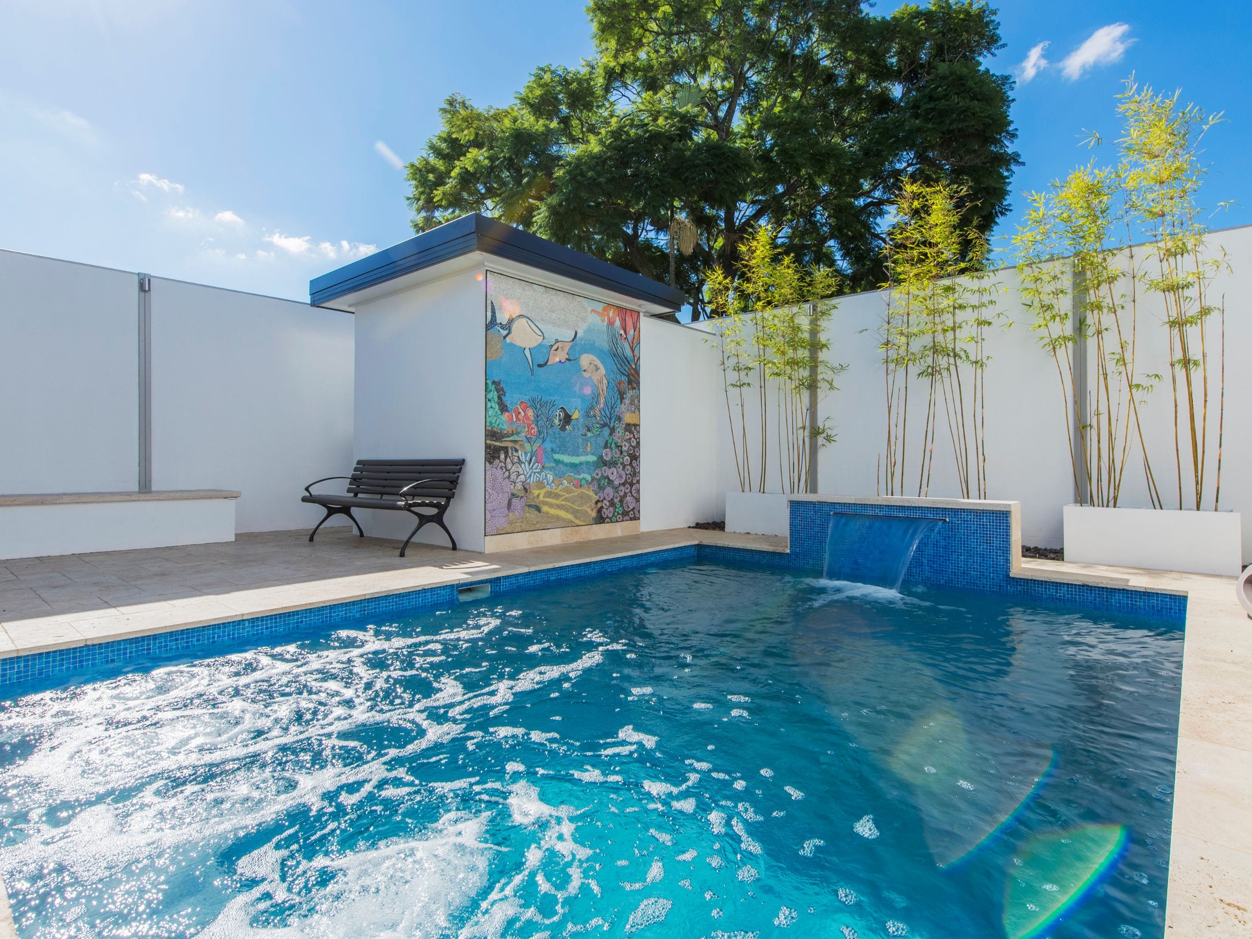 Discover 10 swimming pool feature wall ideas inspired by real Aussie backyards
