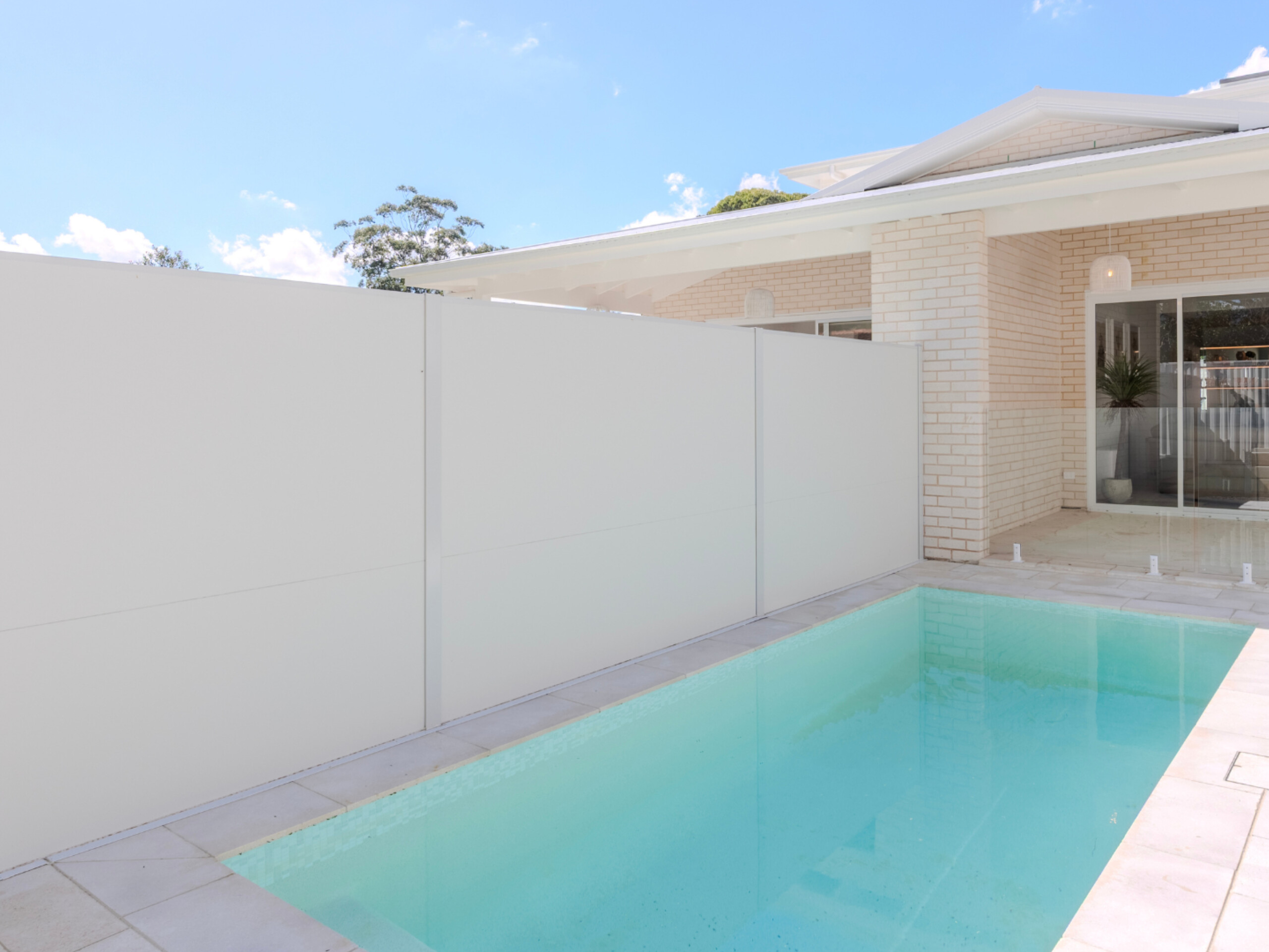 Even a tall, solid fence won't make your backyard completely soundproof. Sound waves can bend around the top and sides of a barrier.