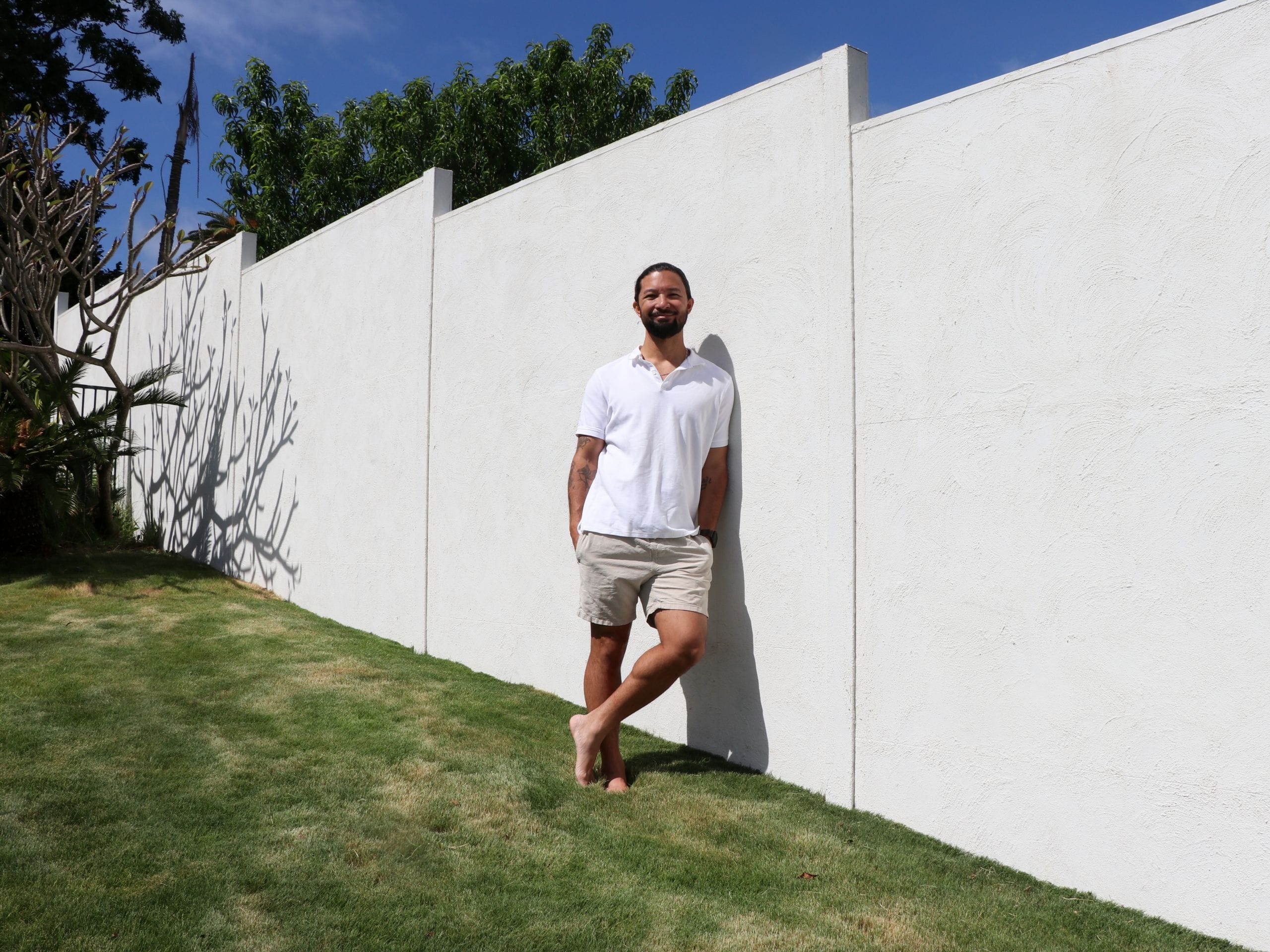 Homeowner Ben used Dulux Medium Texture in Natural White for his coastal-inspired Modular fence project