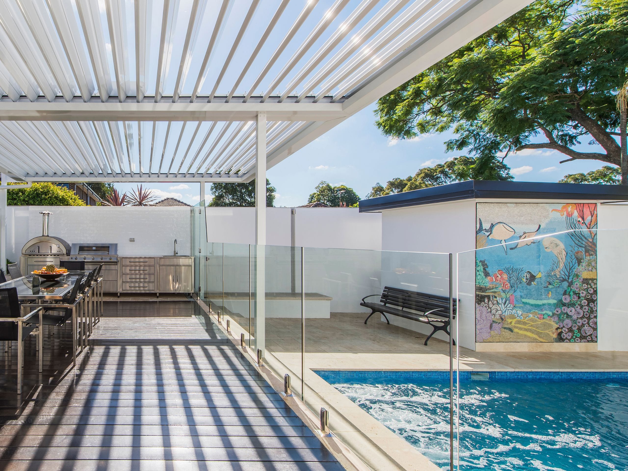 These real backyards show how a swimming pool feature wall can combine privacy and practicality with thoughtful design, to create a pool area that feels considered, cohesive and uniquely yours.